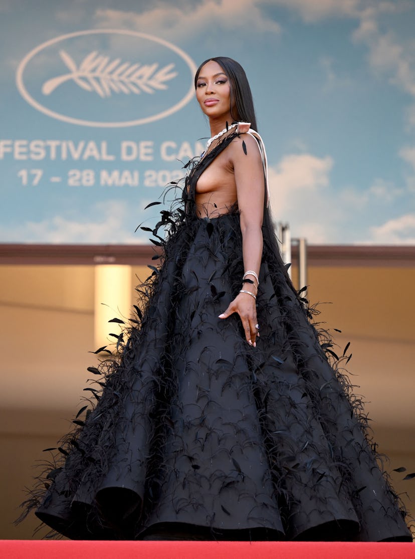 Naomi Campbell wearing a Valentino dress showcasing her side boob at the Cannes Film Festival
