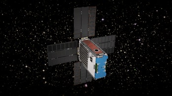 A long box-shaped spacecraft with four panels sticking out, depicted as floating through space. It's...