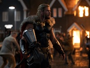Chris Hemsworth as Thor holding his hammer