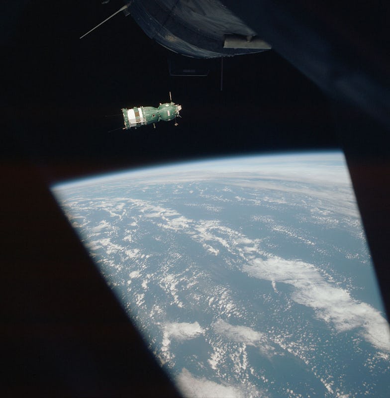  Apollo-Soyuz Test Project floating above the earth