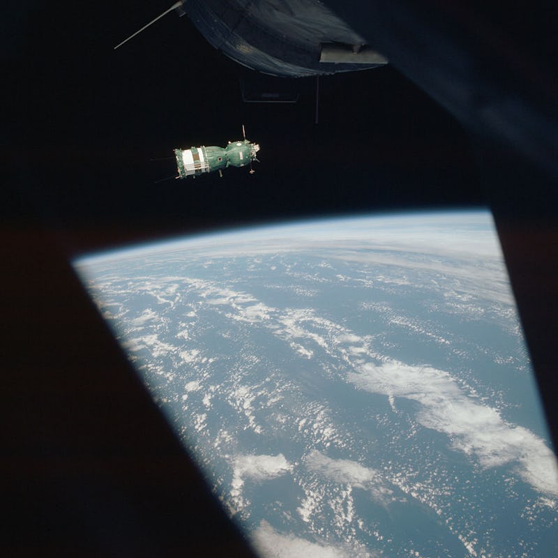 Apollo-Soyuz Test Project floating above the earth