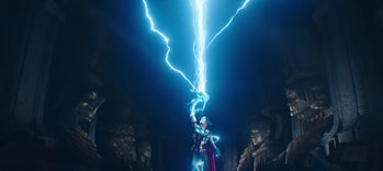 Jane (Natalie Portman) stands in a hall of statues in Thor: Love and Thunder