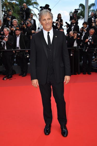 Viggo Mortensen wearing a black Dior suit at the Cannes Film Festival