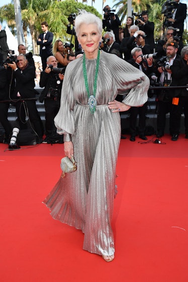 Maye Musk wearing a silver gown at the Cannes Film Festival