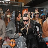 Madonna and FKA Twigs sitting at a Central Saint Martins graduate fashion show