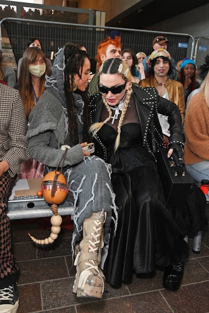 Madonna and FKA Twigs sitting at a Central Saint Martins graduate fashion show
