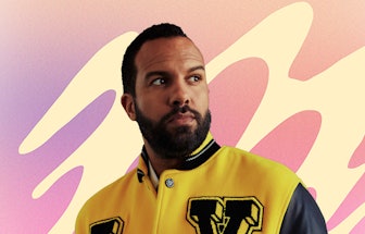 O-T Fagbenle in a yellow and green varsity jacket and a pastel lavender, pink and beige collage bacg...