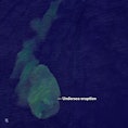 A satellite image depicting the explosion of an underwater volcano near the Solomon Islands.