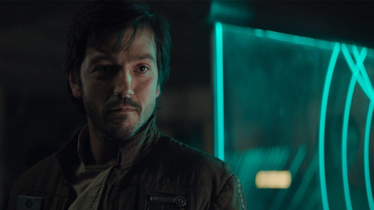 Diego Luna's Cassian Andor stands in a rebel meeting room in 2016's Rogue One: A Star Wars Story