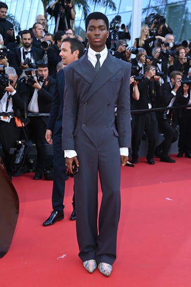 Alton Mason wearing a suit at the Cannes Film Festival