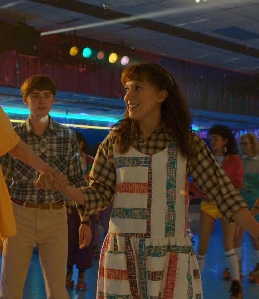 Finn Wolfhard as Mike WHeeler, Noah Schnapp as Will Byers and Millie Bobby Brown as Eleven in STRAN...