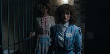 Maya Hawke as Robin Buckley and Natalia Dyer as Nancy Wheeler in Stranger Things 4.