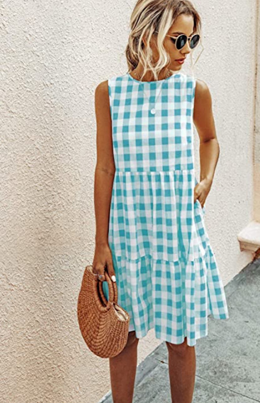 A lightweight sleeveless plaid-print dress will carry you through summer and into fall.