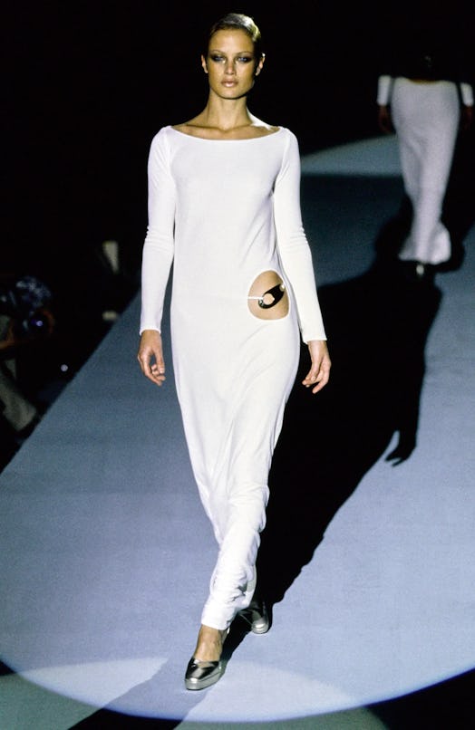 Carolyn Murphy wearing a white dress on the Gucci fall 1996 runway