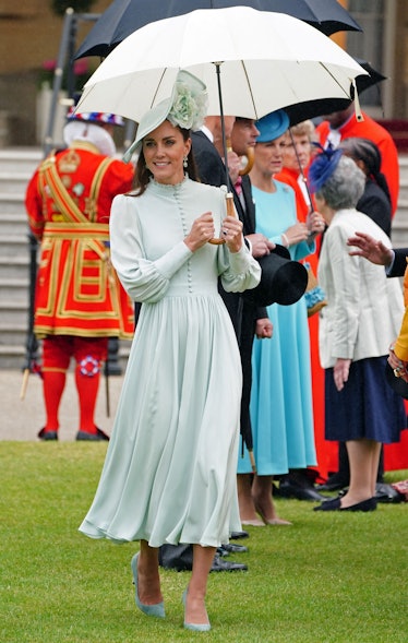 Britain's Catherine, Duchess of Cambridge meets with guests at a Royal Garden Party