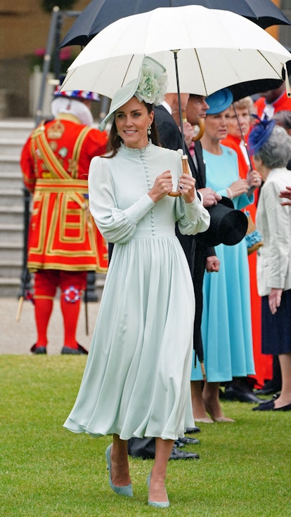 Britain's Catherine, Duchess of Cambridge meets with guests at a Royal Garden Party