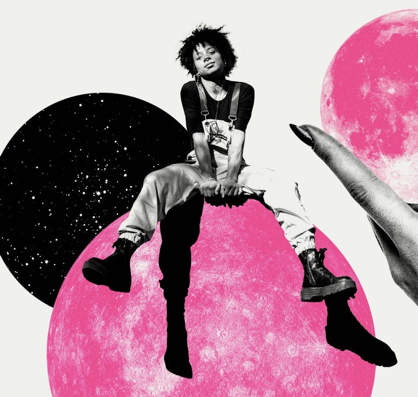 Young woman sitting on a planet after reading her June 2022 monthly horoscope.