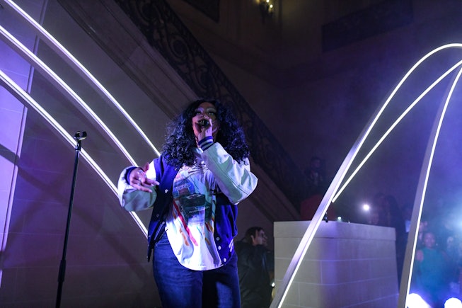 SZA suprise performance on stage at James B. Duke House, a historical mansion on the Upper East Side
