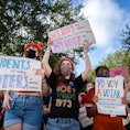 Demonstrators rally against anti-abortion and voter suppression laws at the Texas State Capitol on O...