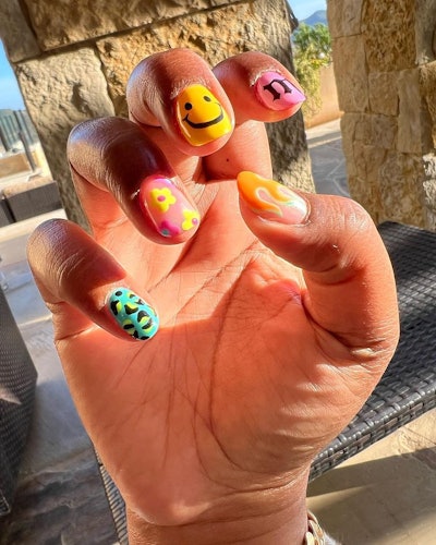 Lizzo smiley face nails