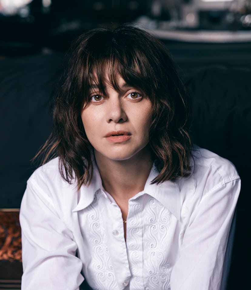 Emma Appleton wearing a white button-down
