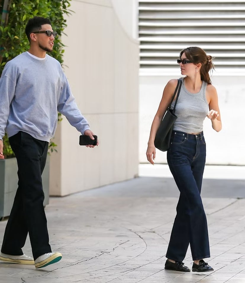 kendall jenner and devin booker both wear gray tops and dark bottoms while out in los angeles on may...