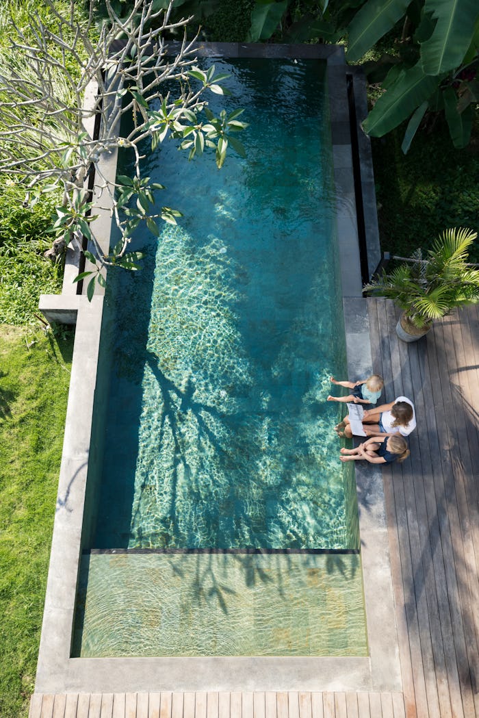  modern pool with a big deck is a family friendly airbnb perk