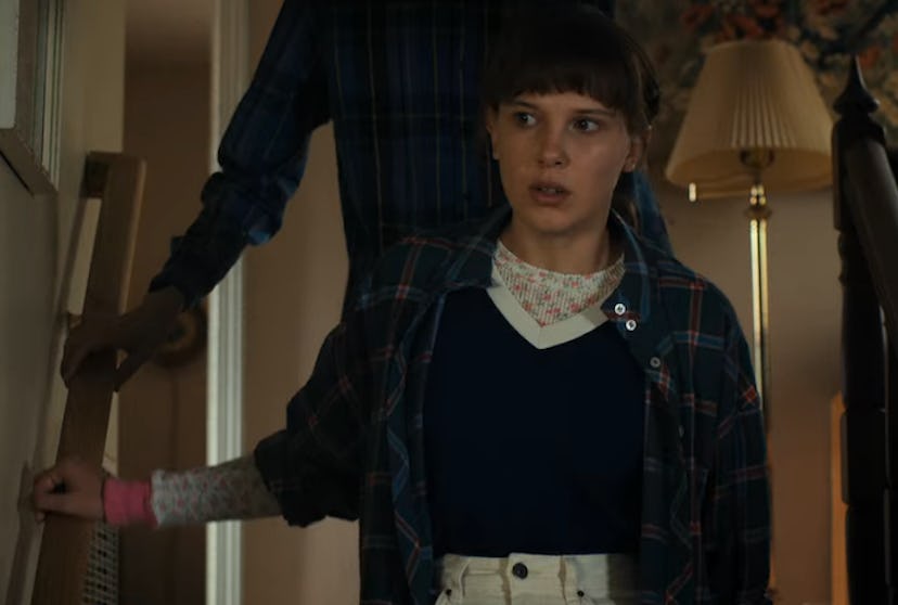 eleven wearing a flannel shirt and white jeans in season 4 of stranger things