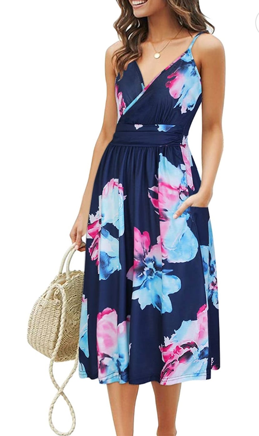 A wrap-waist design, v-neck, and pretty prints make a simple spaghetti strap dress a must-buy.