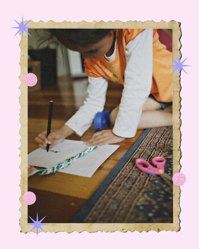 A girl with autism writing a letter to her mom