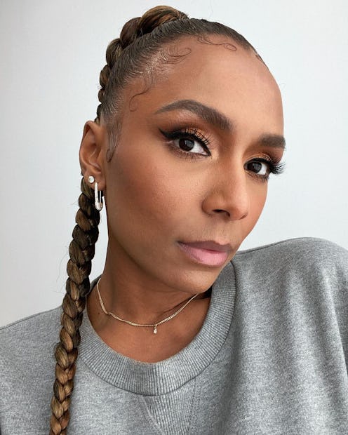 slicked-back braided ponytail