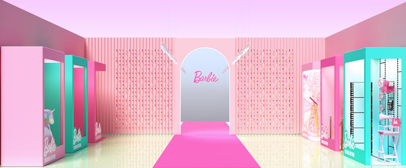 Pose inside Barbie boxes at the fashion studio. 