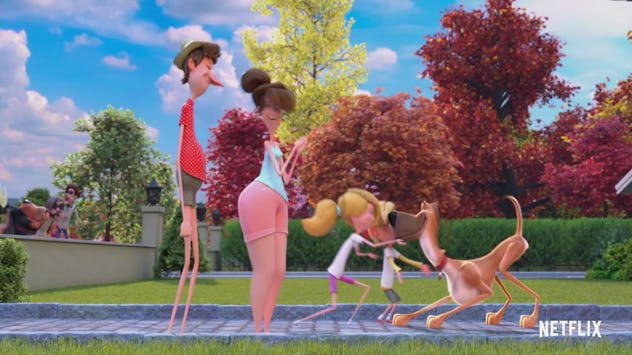 Marmaduke and his family share a special moment in their yard.