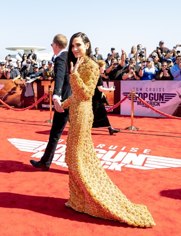 Jennifer Connelly wearing a custom gold Louis Vuitton gown at the 'Top Gun: Maverick' world premiere