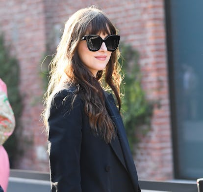 Dakota Johnson attends the Gucci fashion show in 2020