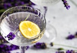 Mother's Day cocktail ideas; two glasses with lemons, flowers