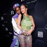 Rihanna and A$AP Rocky hugging 