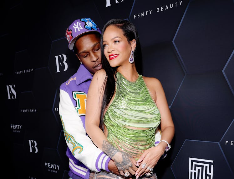 Rihanna and A$AP Rocky hugging
