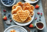 Mother's Day Breakfast Ideas; spread of heart-shaped waffles and berries