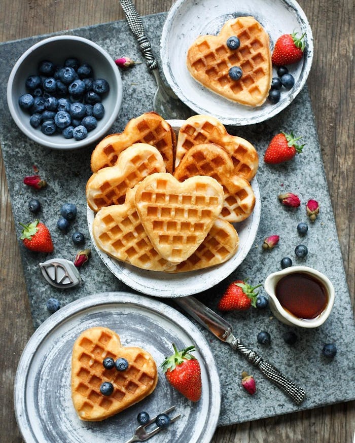 Mother's Day Breakfast Ideas; spread of heart-shaped waffles and berries