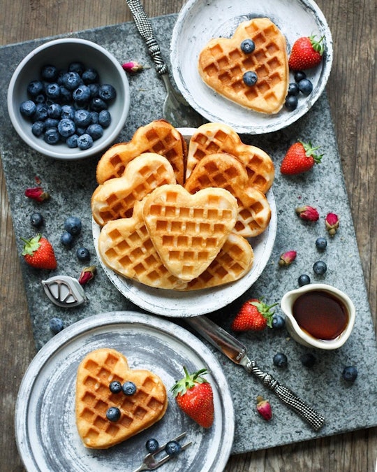 Mother's Day Breakfast Ideas; spread of heart-shaped waffles and berries