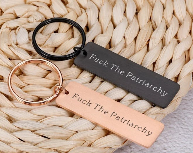 Leather keychain saying fuck the patriarchy is a great gift for stepmother's day