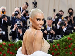 Kim Kardashian wearing one of Marilyn Monroe's iconic dresses to the 2022 Met Gala.