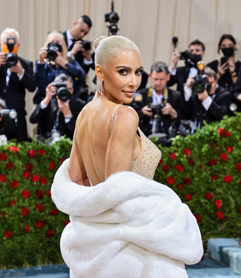 Kim Kardashian wearing one of Marilyn Monroe's iconic dresses to the 2022 Met Gala.