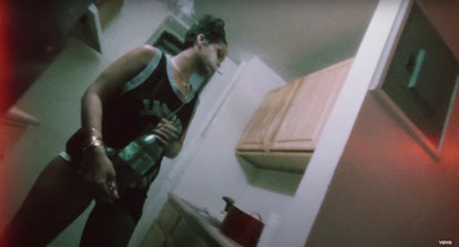 Rihanna's messy updo in the D.M.B. music video.
