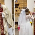 A seven-year-old girl takes her First Holy Communion by nibbling the cracker and then chugging the g...