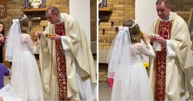 A seven-year-old girl takes her First Holy Communion by nibbling the cracker and then chugging the g...