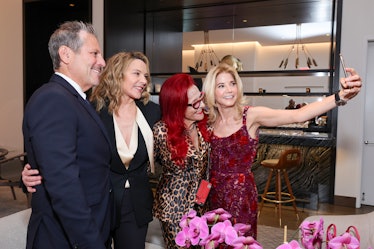 Darren Star, Kim Cattrall, Patricia Field, and Candace Bushnell taking a selfie