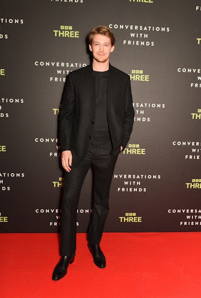 Joe Alwyn wearing a black suit at a 'Conversations With Friends' screening