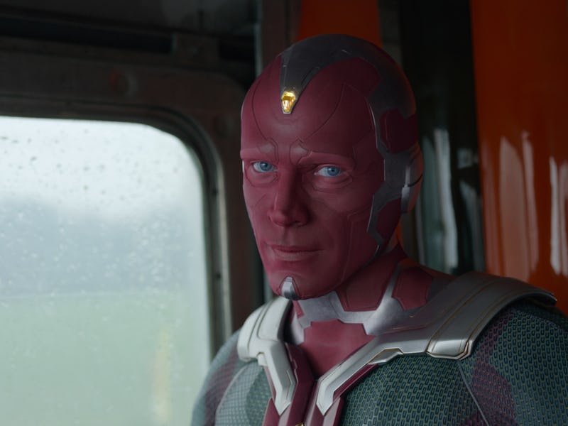 Vision sitting in a vehicle, whose glaring absence is apparent in Marvel's Earth-838 reality
